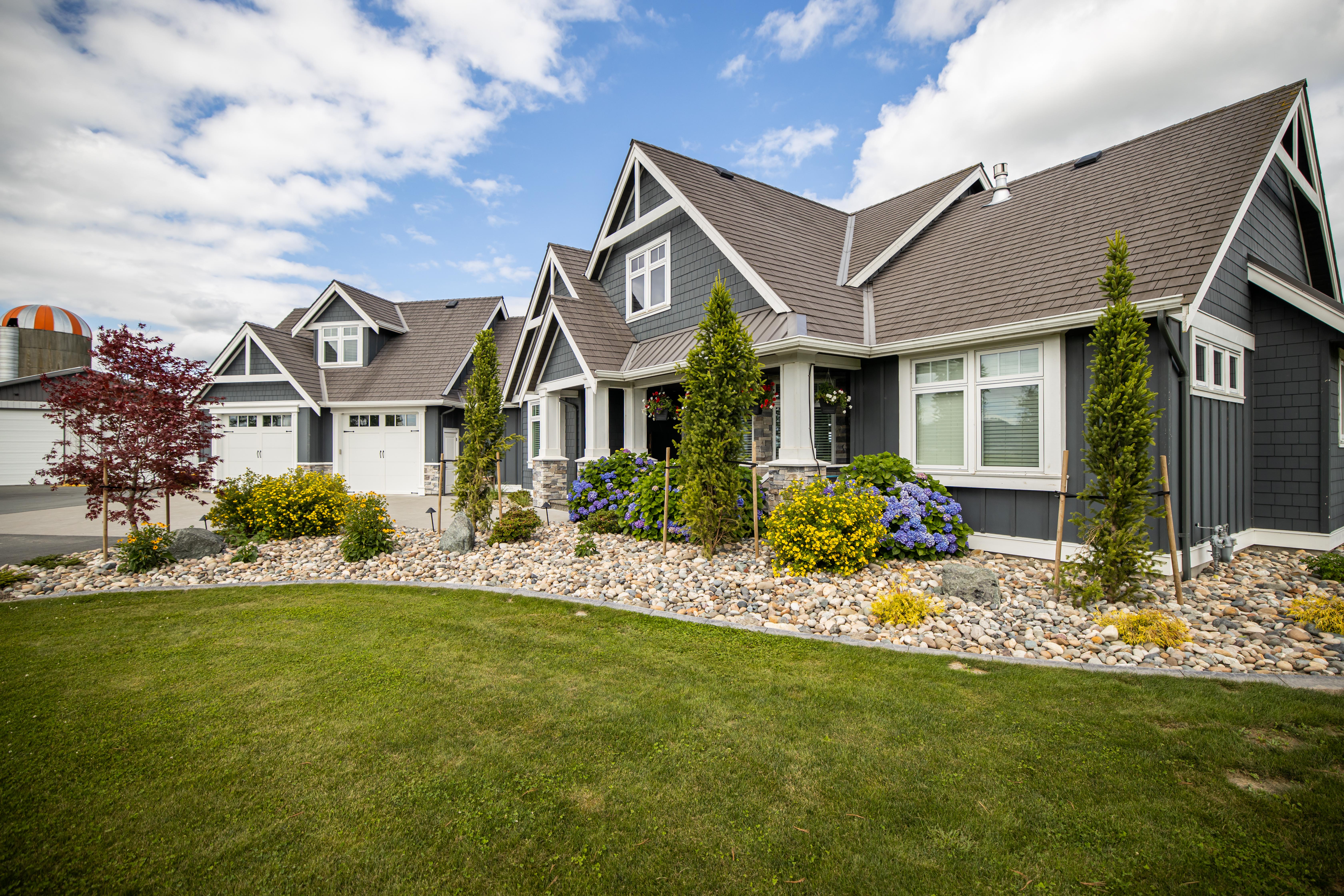 house with rocky garden