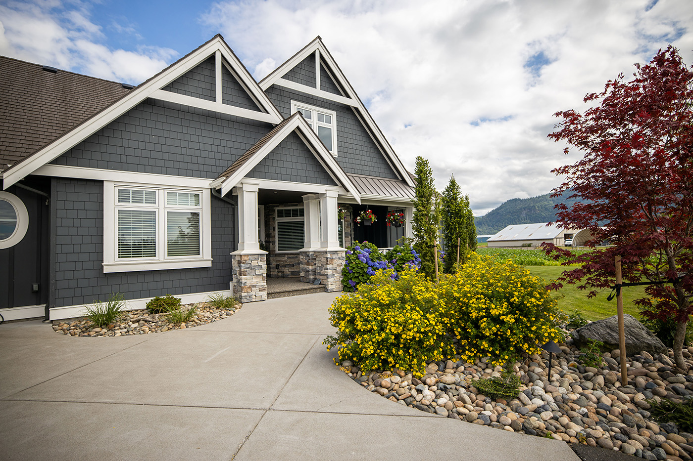 house with driveway and garden