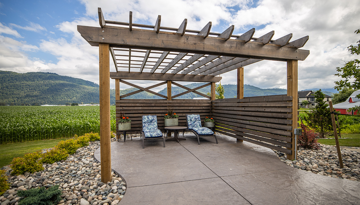 pergola with lounge chairs