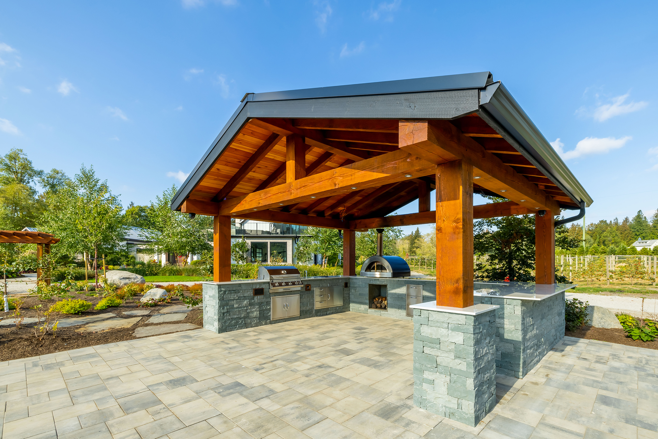 Outdoor structure over outdoor kitchen