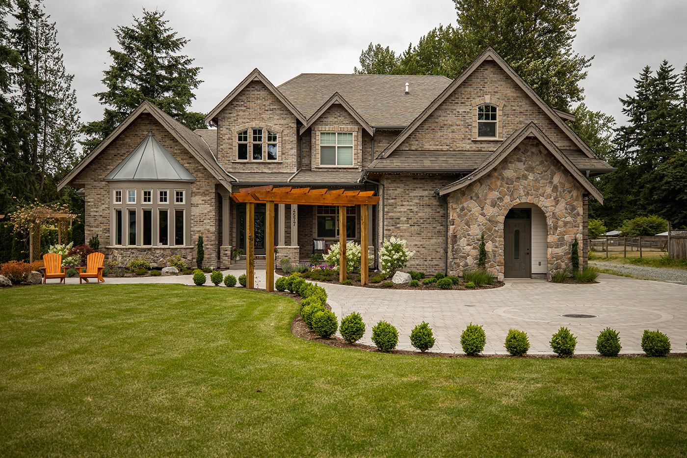house with garden and stone driveway
