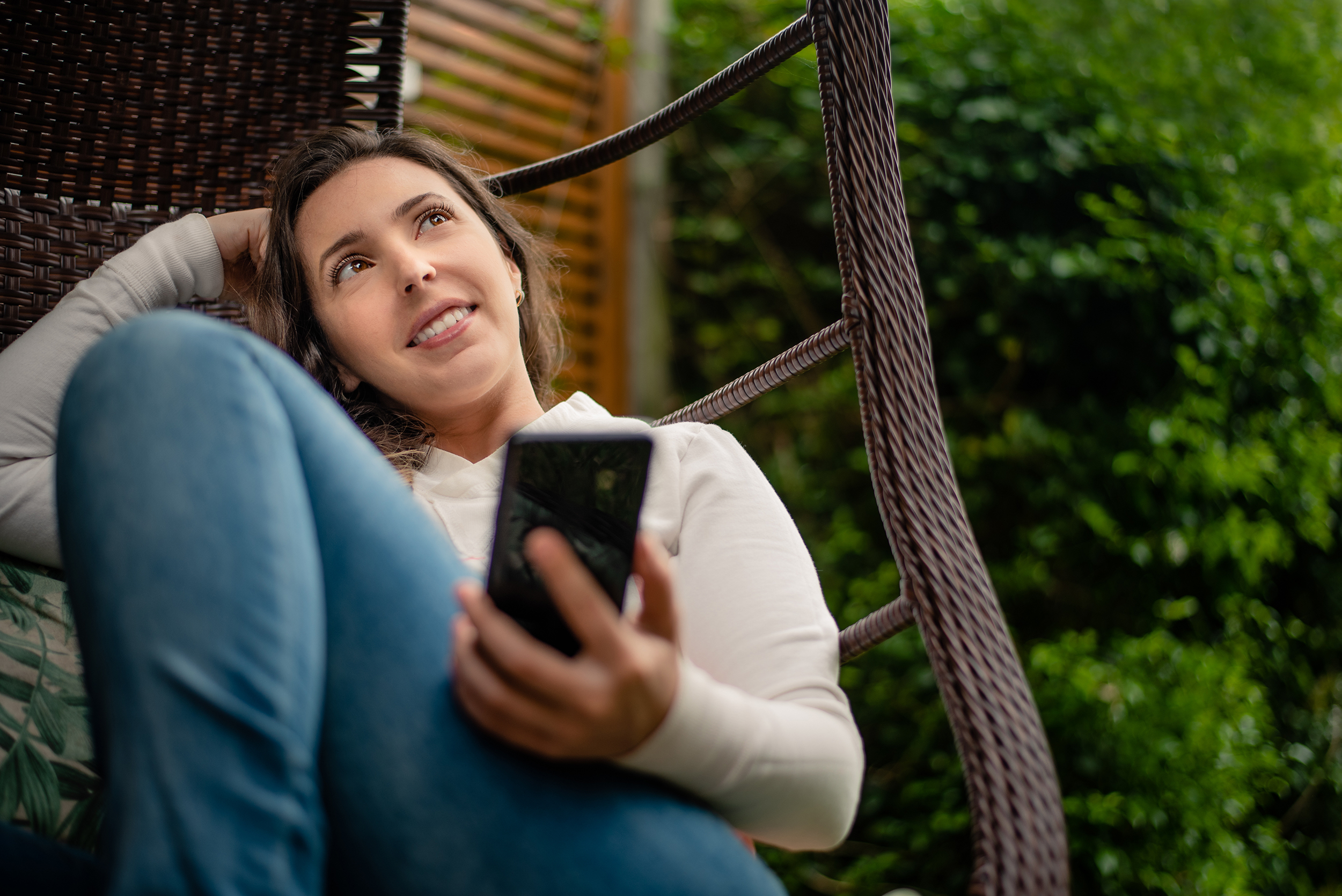 Woman relaxing with cell phone